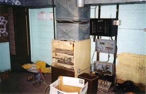 Inside the projection booth, note the equipment left behind.