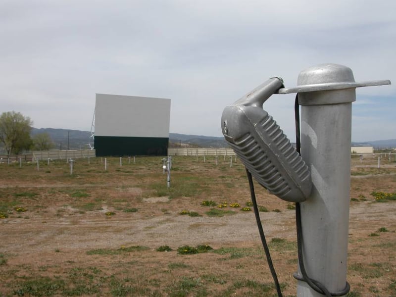 This drive-in theater still has all the poles with speakers attached.  Very cool place.