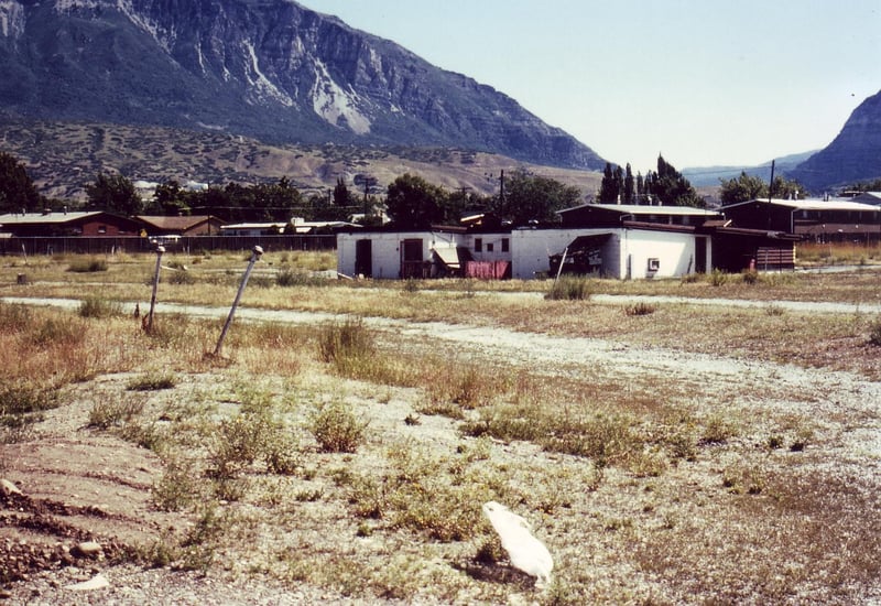 Projection/concession building with 2 lonely speaker poles on the left