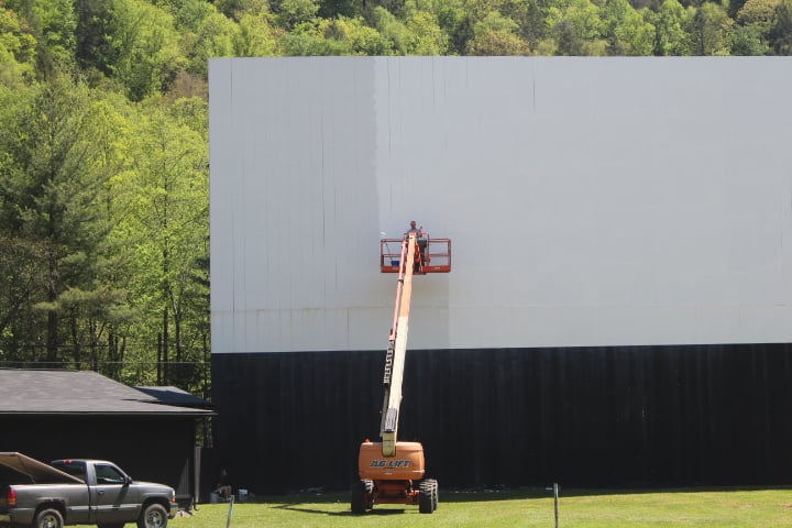 painting the screen for the new digital projector