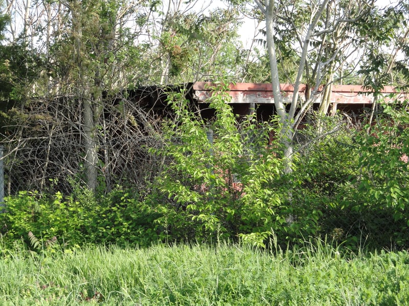 back of projection building from US-460 on ramp