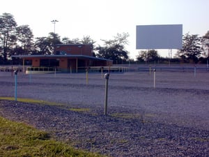 speakers, screen, projection building