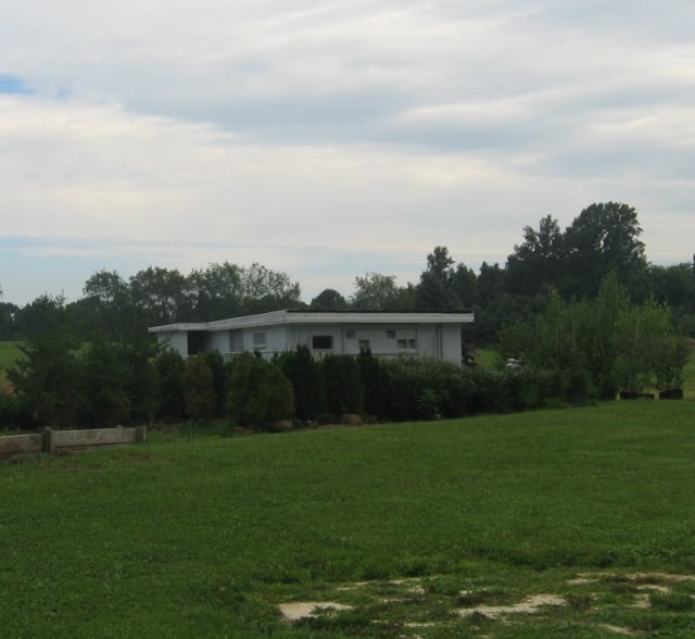 Former protection booth and snack bar building.