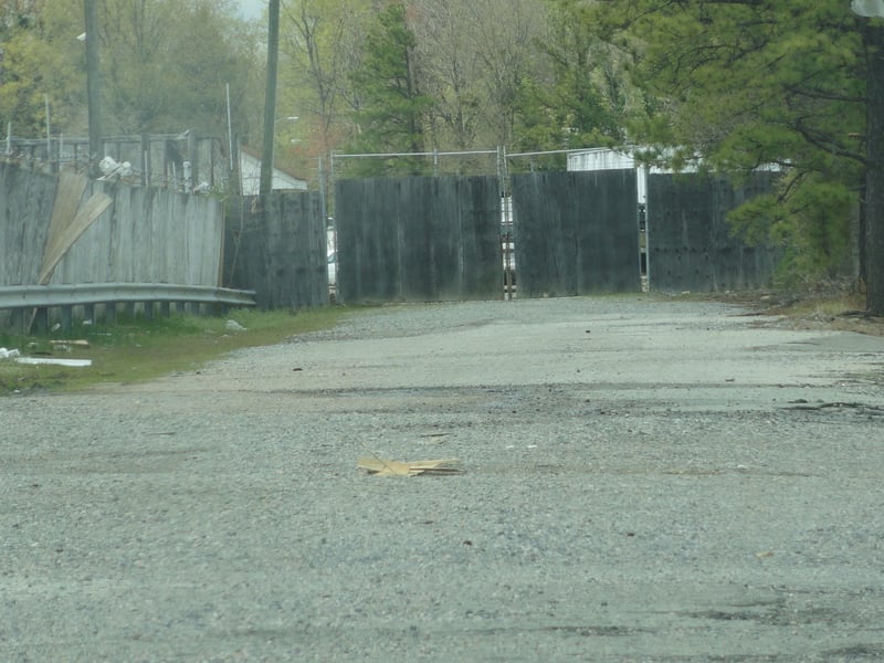 Former entrance road behind the Plaza shopping center-now an auto auction business