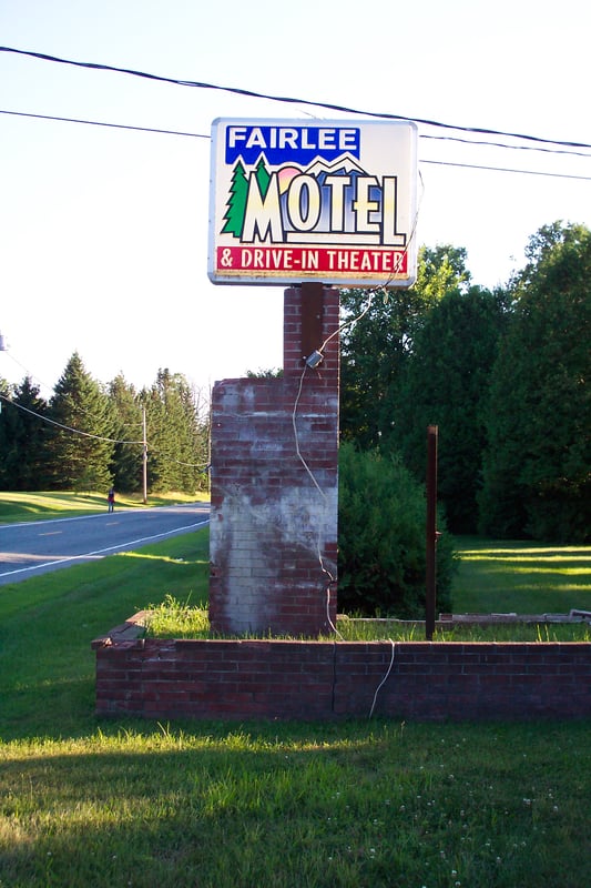Motel/drive-in sign.