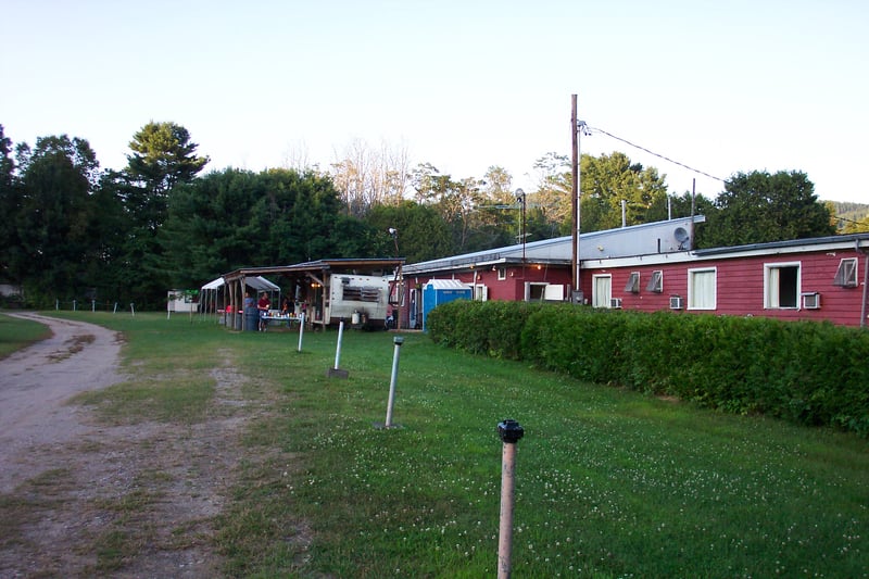Side view of rear of lot showing snack bar and motel rooms.