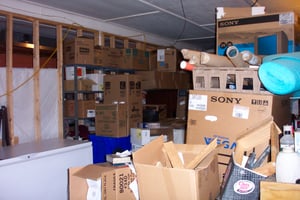 Interior view of former snack bar area, now apparently used for storage.