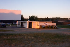 Snack bar and screen 1 with the sun setting.