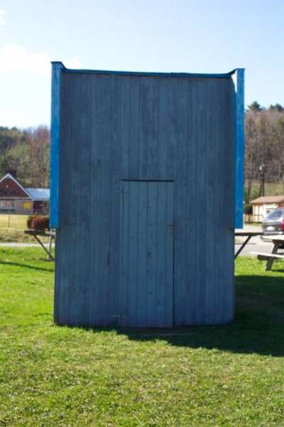 rear view of marquee with door for letters and ladder.