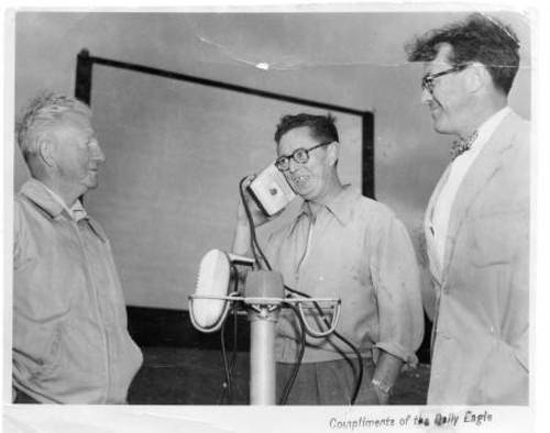 The screen and owners/managers(?) of the White River Drive in around the year it opened - 1952.  Identities of persons pictured is being investigated.