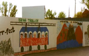 Mural on fence facing the elementary school next door