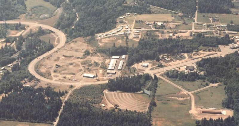 Aerial, looking south across Highway 101, Port Angeles Drive In in the foreground.