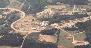 Aerial, looking south across Highway 101, Port Angeles Drive In in the foreground.