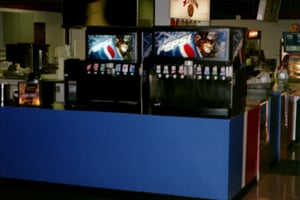 the self-serve drink station with butter dispenser to the left