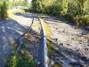 Old exit ramp on left is still used.  Old entrance ramp has been neglected.