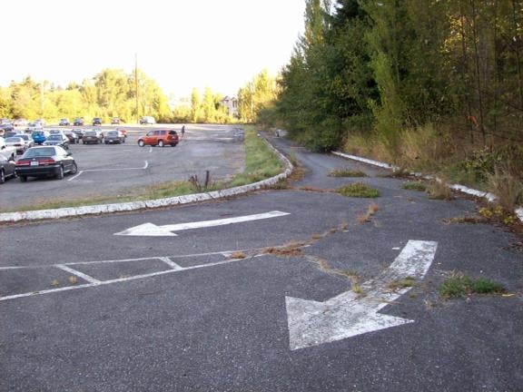 Entrance road just before the ticket booth.  Painted arrows are still bright and clear.