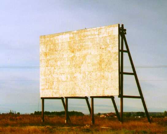 Front of screen, consiting of painted plywood boards.  I could have sworn individual screen tiles were missing when I went by this theater on my commutes to Washington State University in the late 1980s, so perhaps since then someone put up a newer screen