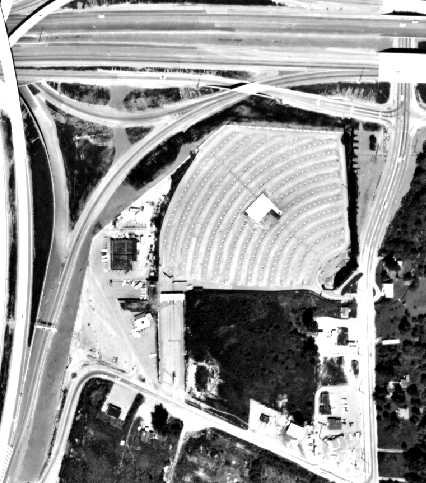 Aerial view of the Sunset. The back row used to form a complete arch to a point directly north of the screen, but part of the lot was lopped off for the freeway offramp.