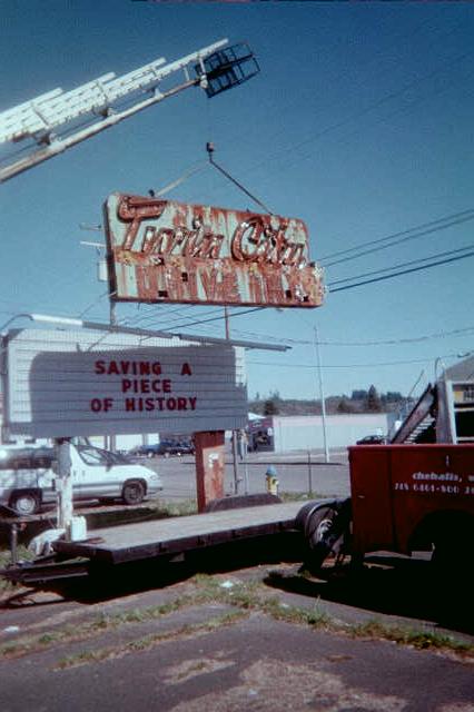 Twin City marquee being lifted from its installed position