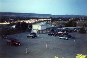 view of field and main building