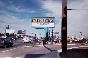 Sign for the car dealer at the site of the Y today.