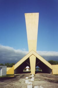 Drive under the screen tower to get to the screen you want to watch.