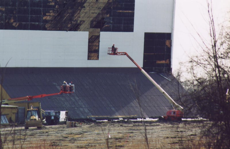 The screen had to be taken down panel by panel because they were made out of asbestos.