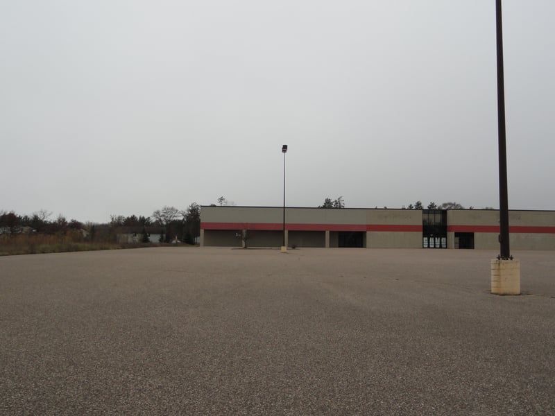 former site-empty building and lot