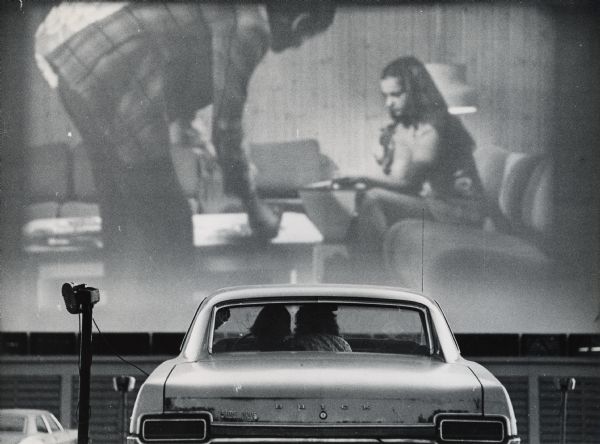 Picture of the Big Sky Drive-In, a couple watching movie in car, taken out of local newspaper, circa 1974 For Info see Link httpbit.lybI1b5Y