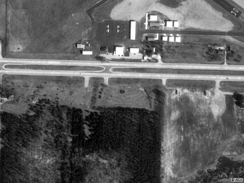 TerraServer image shows faint lane remnants and concession building. Screen was removed when Highway 10 was widened