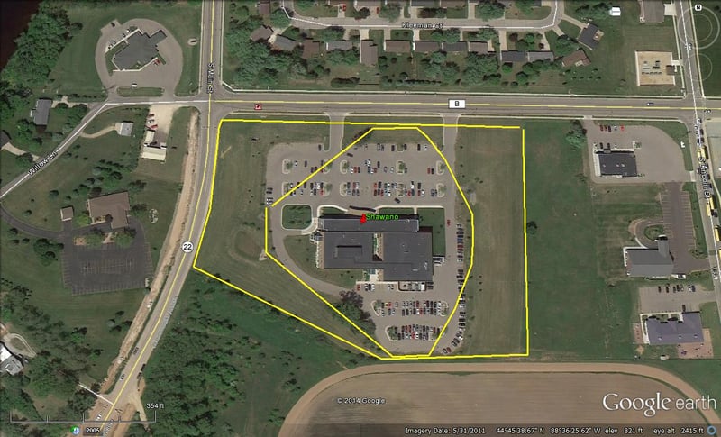 aerial view with former site outlined