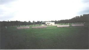 The reclined benches in the front row facing the screen.