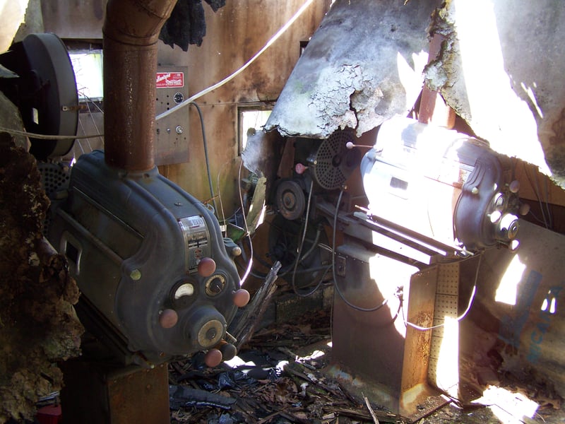 Here is a picture of the dual projectors inside the movie house. As you can see, the roof has completely collapsed on top of them.