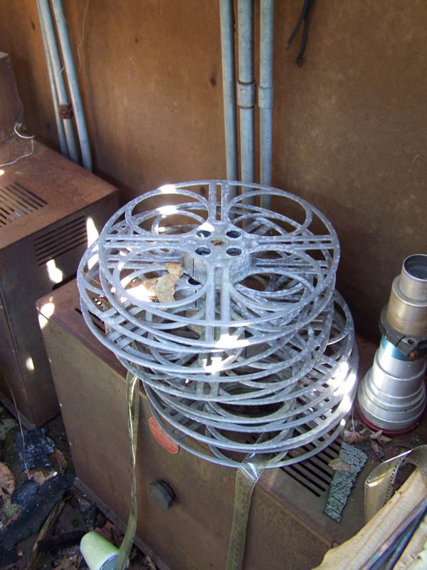 Here is a picture of the reels 'as is'. These have not been touched in YEARS! You can still see the film in them.