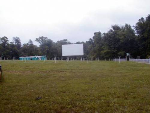 Pictures of the entrance, consession/projection building, Screen and parking area, and Marquee