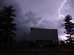 Mt.Zion Drive in. Screen and lightning.  Storm damage on the screen