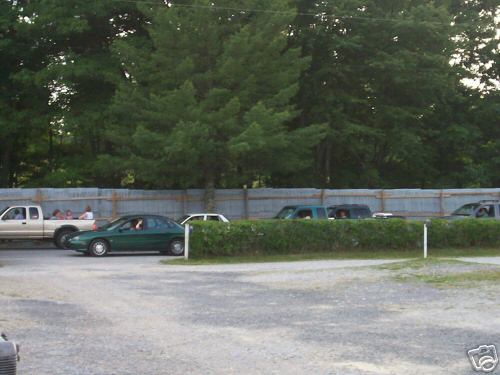 Cars lined up and waiting to enter the theater.