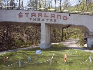 a less washed-out pic of the front arch, ticket booth, and driveway. (from driveintheater.com)