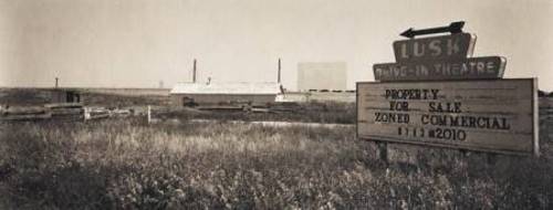 black and white pic of marquee, ticket booth, lot, and screen tower(from carlweese.com)