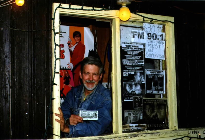 Owner L. Baxter displaying Drive-In Paper-Money printed for an earlier promotion.