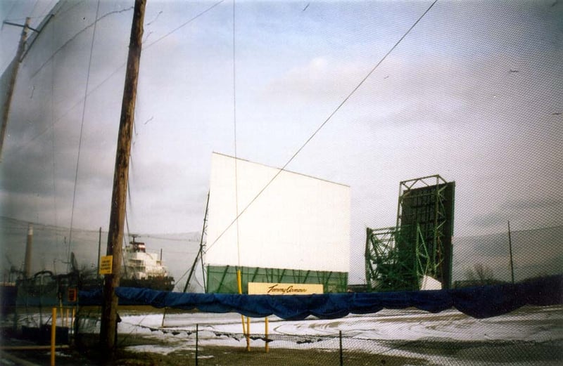 Docks' Screen through the golf netting. The Docks is a driving range by day.