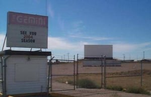 screen, lot, + ticket booth, boarded up for the off-season.