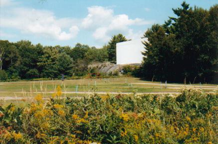 Screen sits atop a rocky bluff.