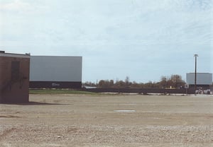 Theatre 2 projection booth and screen on left; screen 1 on right