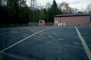 This is the holding pen, you can see the row numbers on the pavement. It holds about 60 vehicles.