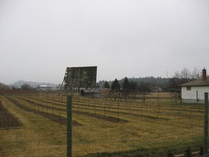 Screen tower across the orchards.