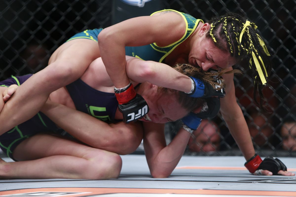 Carla Esparza lands ground and pound on Rose Namajunas. Credit: MMA Fighting.