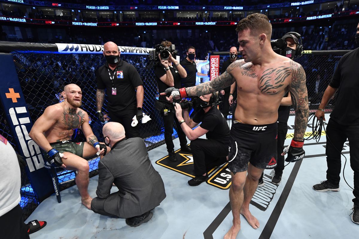 Dustin Poirier taunts Conor McGregor after finishing him in round 2. Credit: MMA Fighting.
