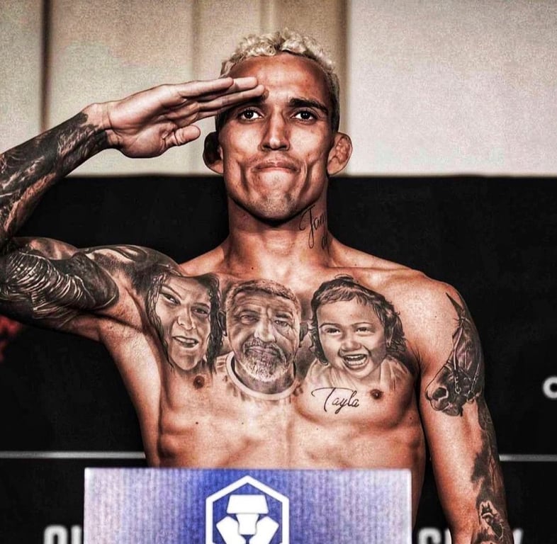 Charles Oliveira makes championship weight. Credits to: Zuffa LLC
