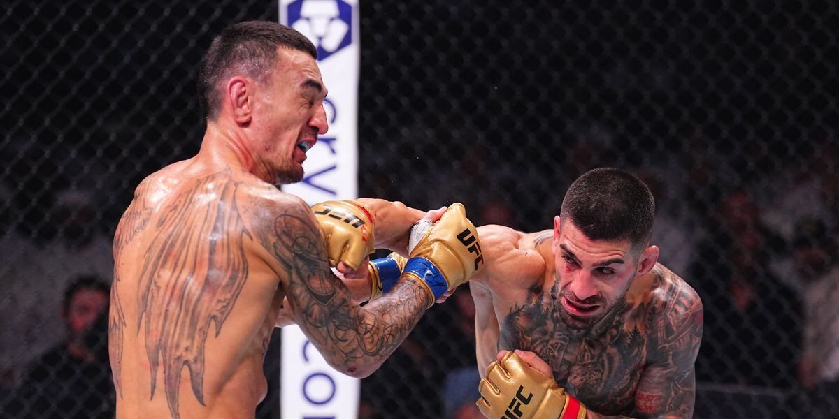 Ilia Topuria lands a right hand on Max Holloway at UFC 308. Credit: Chris Unger/ Zuffa LLC